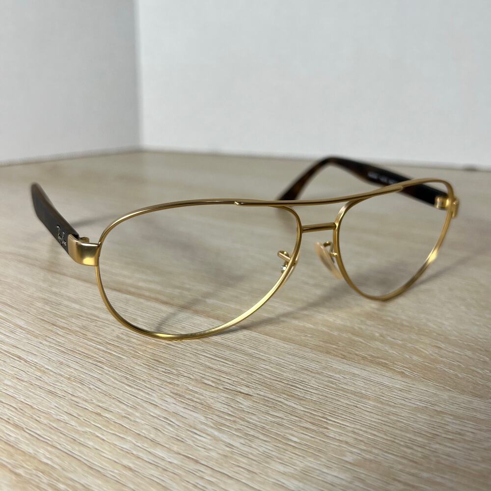 Ray-Ban Gold Metal Aviator Sunglasses with Black Temples vintage Frame RB 3457